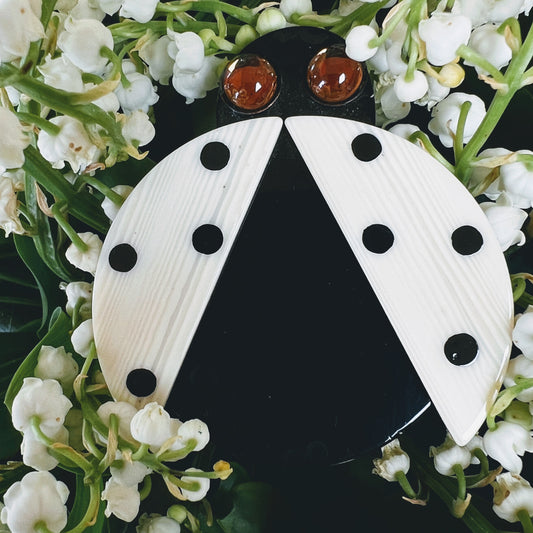 White Ladybug in Flight Brooch