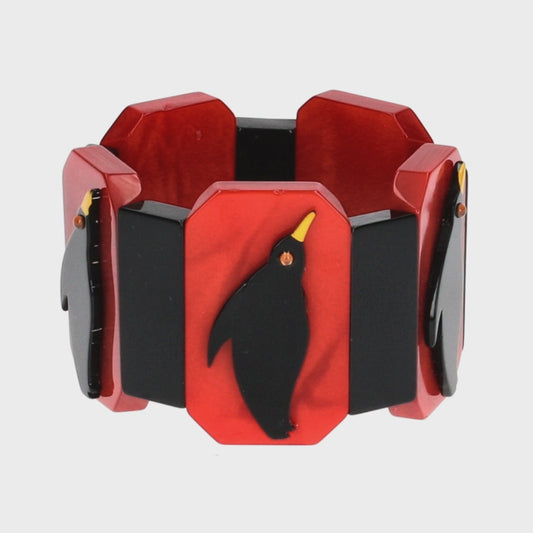 Black and Red Penguin Bracelet The penguin bracelet is mounted on an elastic band. This allows it to fit almost any wrist. It is available in several other colors